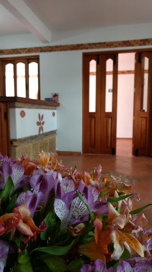 Apartahotel La Gran Familia Villa de Leyva Buitenkant foto